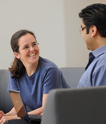 Professor Nathalia Peixoto with a student